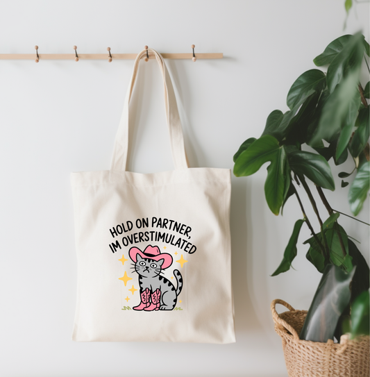 Hold On Partner, I'm Overstimulated Canvas Tote Bag
