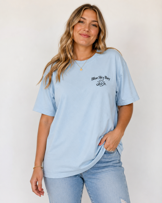 Blue Sky Bay Embroidered Comfort Colors® T-Shirt | Officially Licensed Laura Pavlov Merchandise
